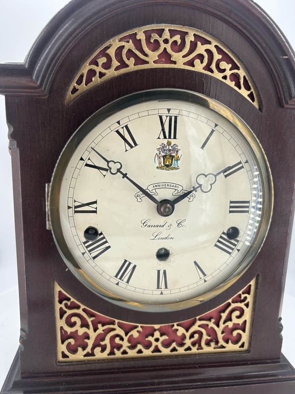 Stunning Elliot Exhibition Bracket clock ca 1985. Wonderful original dial and hands. Lovely fretwork side panels. The movement is a Elliot 8 day triple chime with engraving.