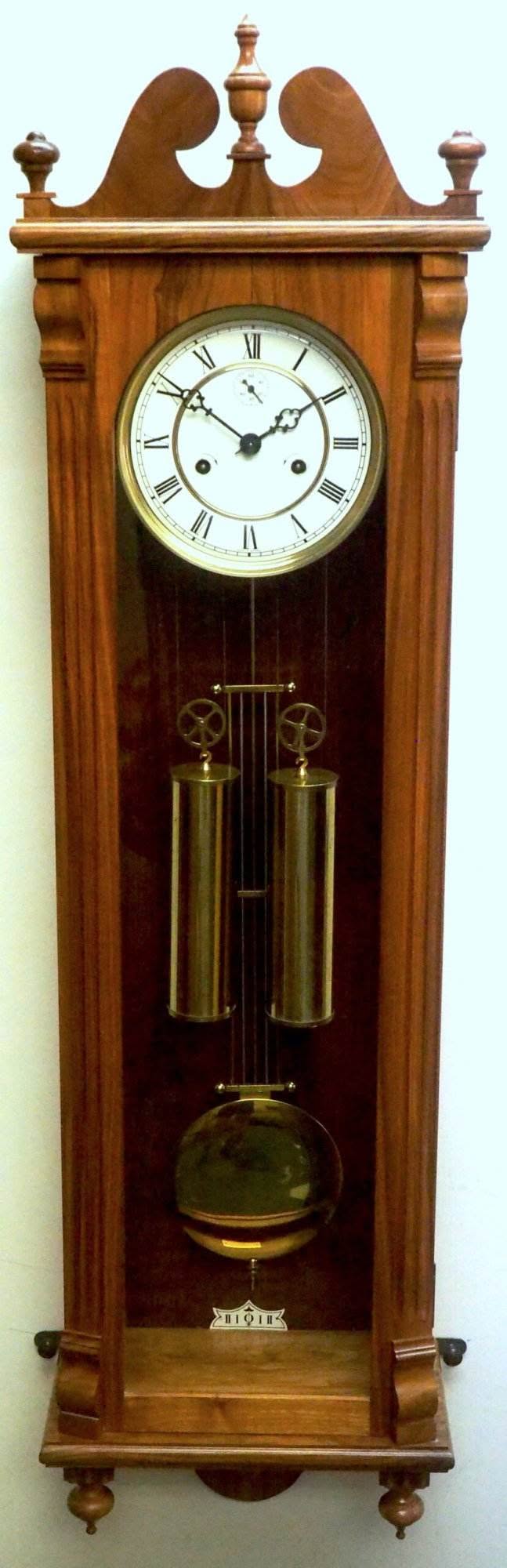 Solid Walnut Hermle Vienna Wall Clock 8 Day Weight Driven Striking Wall Clock