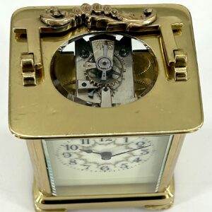 Stunning antique Victorian carriage clock. A Collectors piece, it displays very well with its original finish case and wonderfully clean white enamel dial with charming floral decoration.