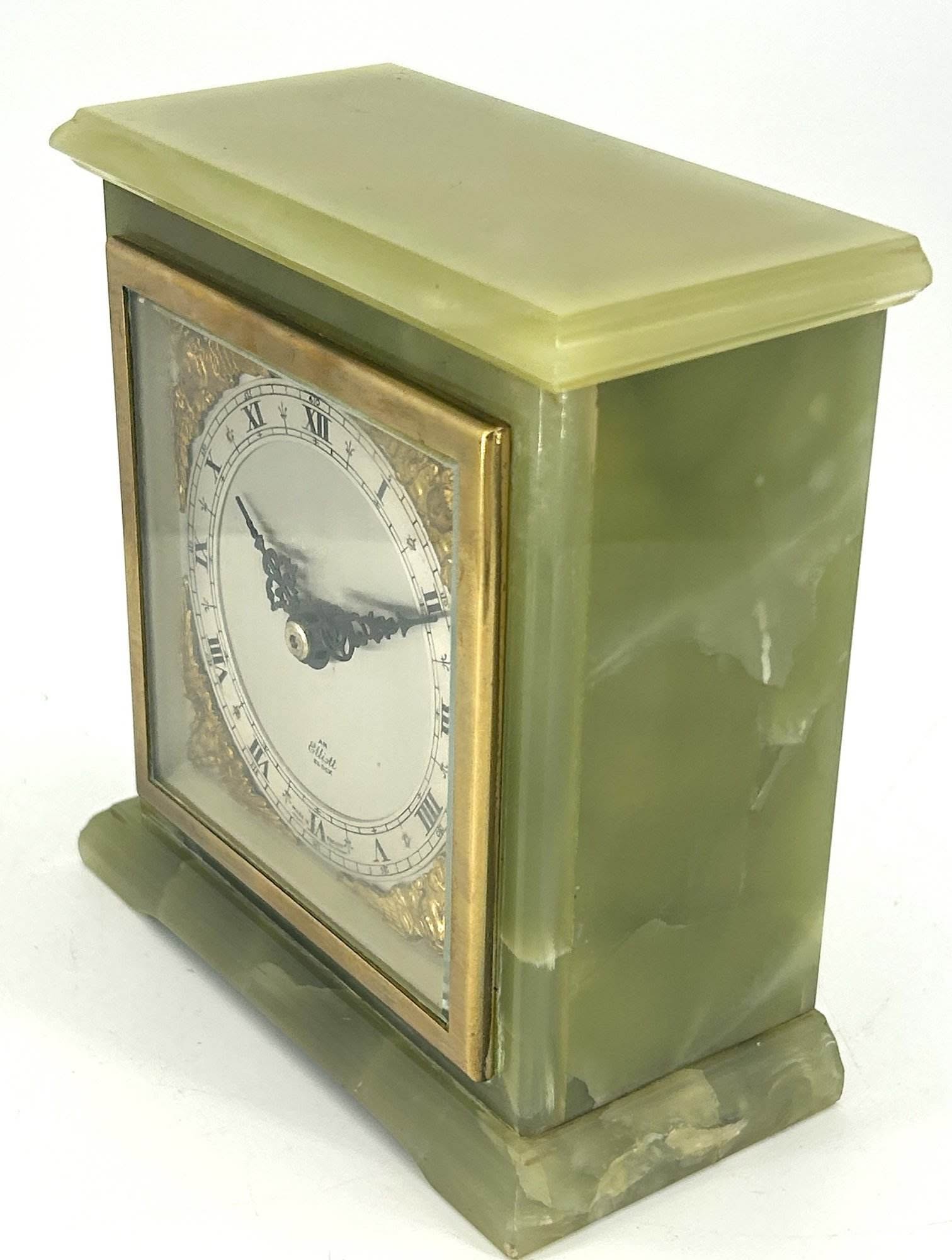 Stunning green onyx case Elliot and co 8 day mantel clock. Elliot silver metal dial with ormolu spandrels.
