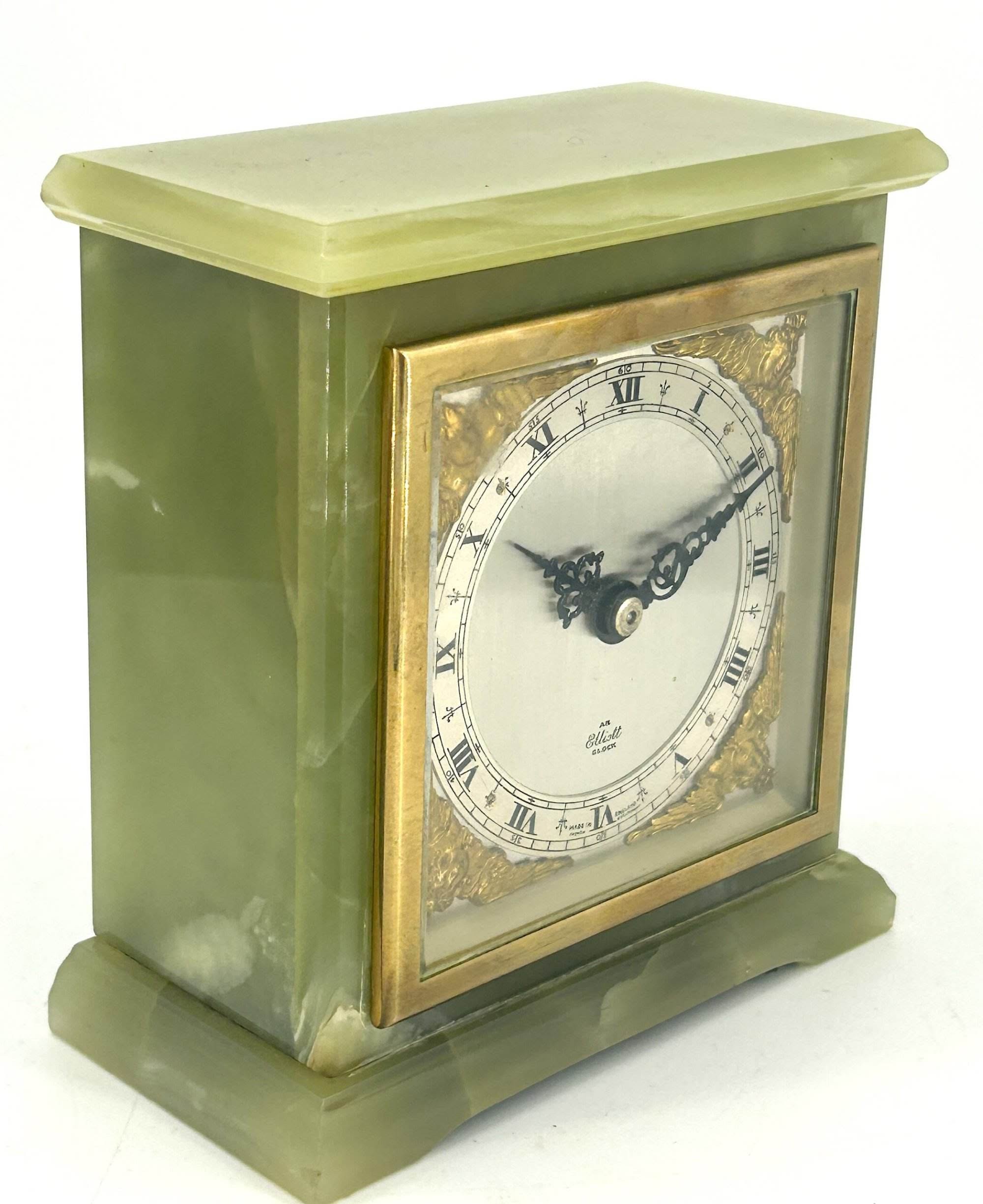 Stunning green onyx case Elliot and co 8 day mantel clock. Elliot silver metal dial with ormolu spandrels.