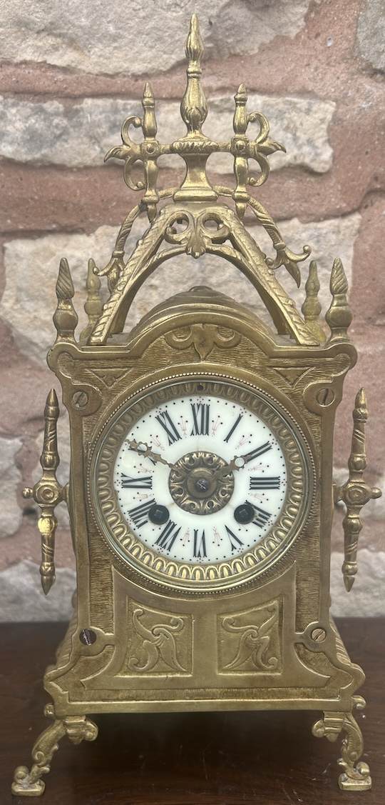 Original enamel dial Original gothic style hands Bronze ormolu case Original finish French 8 day bell striking movement Working Order, recently serviced Comes with key Measures 36cm height, 18cm width. 11cm depth. Fantastic Victorian bronze ormolu mantel ca 1890 Original enamel dial with original gold tone hands. The movement is an 8 day bell striking movement. Bronze ormolu architectural design case. Good condition for age, showing minor signs of age and cosmetic wear to the case and dial. Please view the many photos make sure you would be happy.