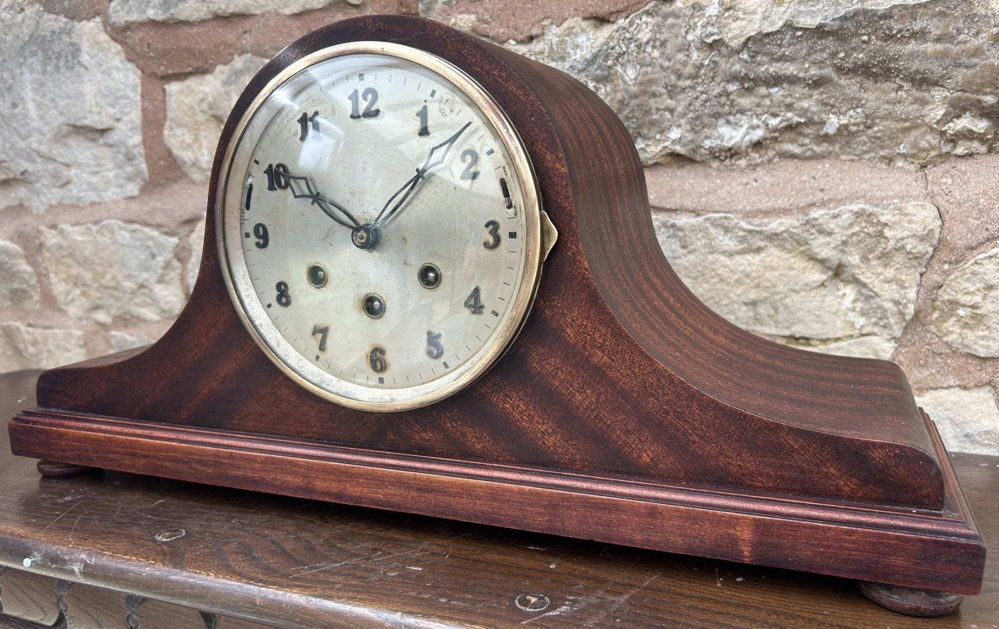 Fantastic Gustav becker triple chime Mantel clock ca 1900. Original dial with original ornate hands under convex glass bezel. The movement is an 8 day gong striking French movement. Mahogany hat shaped case.