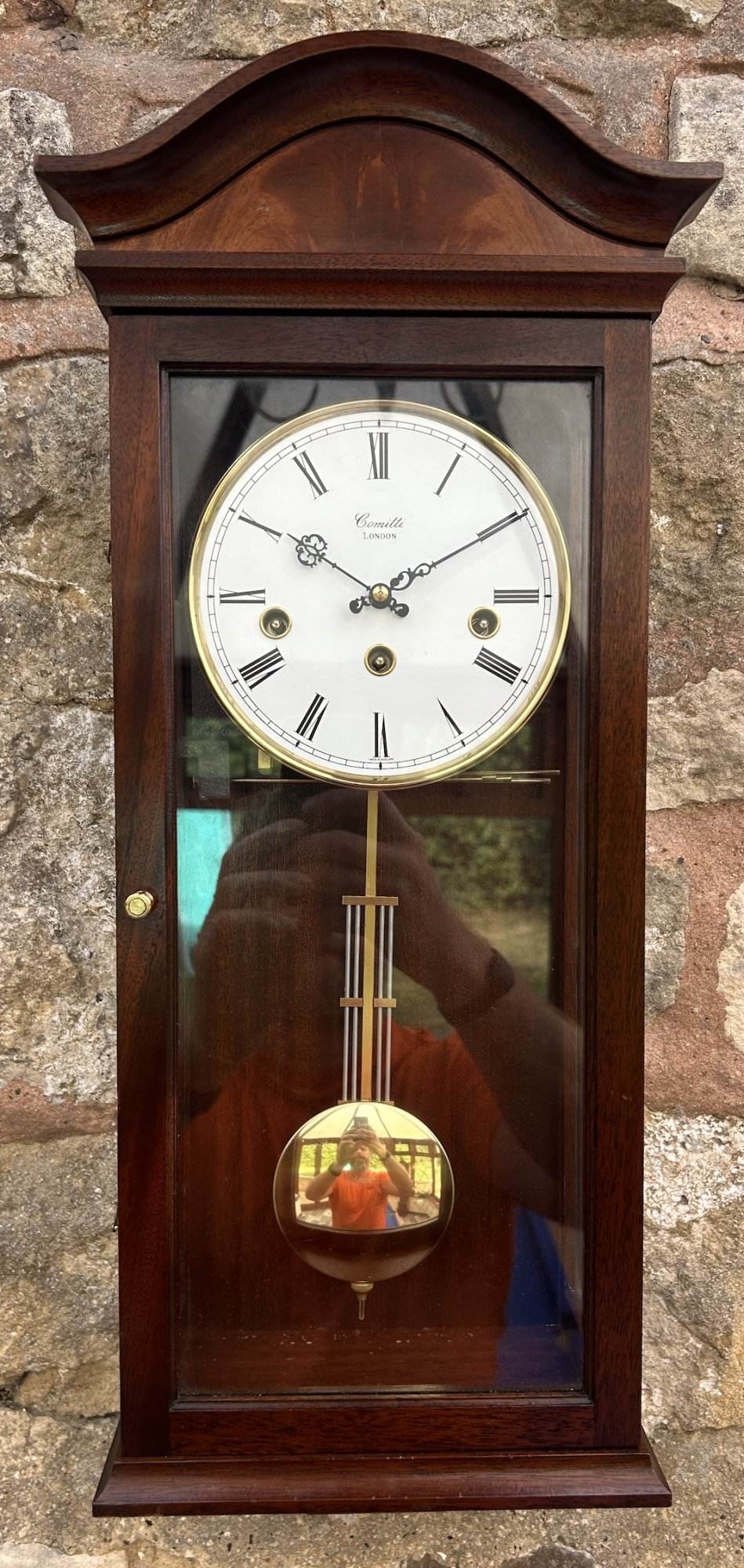 Westminster chime clock, chimes to the quarter, half’s and hour. Strike silent lever. Arched top solid mahogany case, glazed panel to see the pendulum in action. All original features.
